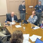 From left, Finance Committee members Tony Sassen, Mike Rein and Eric Entrup and Quincy Mayor Mike Troup discuss a $4 million transfer from the city's $6 million general fund balance to the water and sewage fund to pay for a water main replacement project on Broadway from 24th to 30th Street. Standing between Rein and Entrup is Director of Public Works Jefrey Conte.