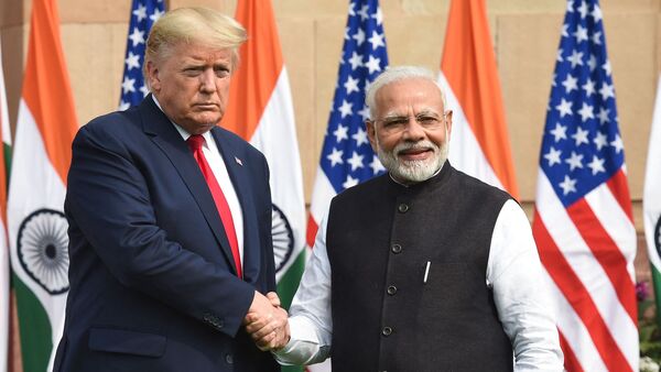(FILES) Prime Minister Narendra Modi (R) shakes hands with US President Donald Trump before a meeting at Hyderabad House in New Delhi (Photo by Prakash SINGH / AFP)(AFP)