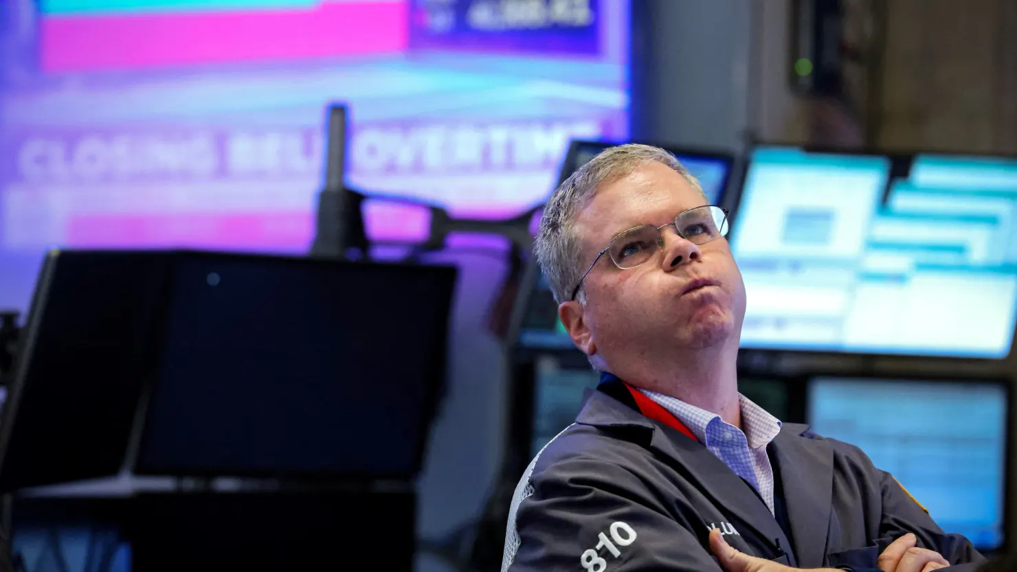 A trader reacts after the closing bell on the floor at the New York Stock Exchange on April 15, 2025.
