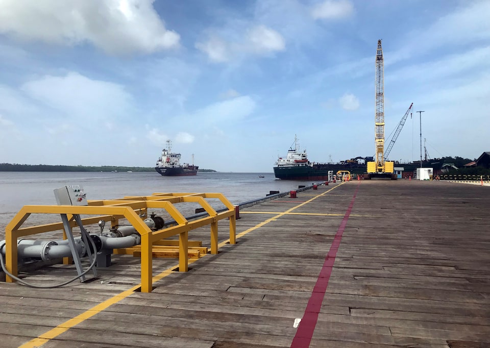 Vessels carrying supplies for an offshore oil platform are seen, south of Georgetown, Guyana