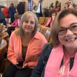 Pam Zottos and Cheryl Sullivan are pictured Tuesday at the crowded public hearing on House budget by the Senate Finance Committee in Representatives Hall in the State House.