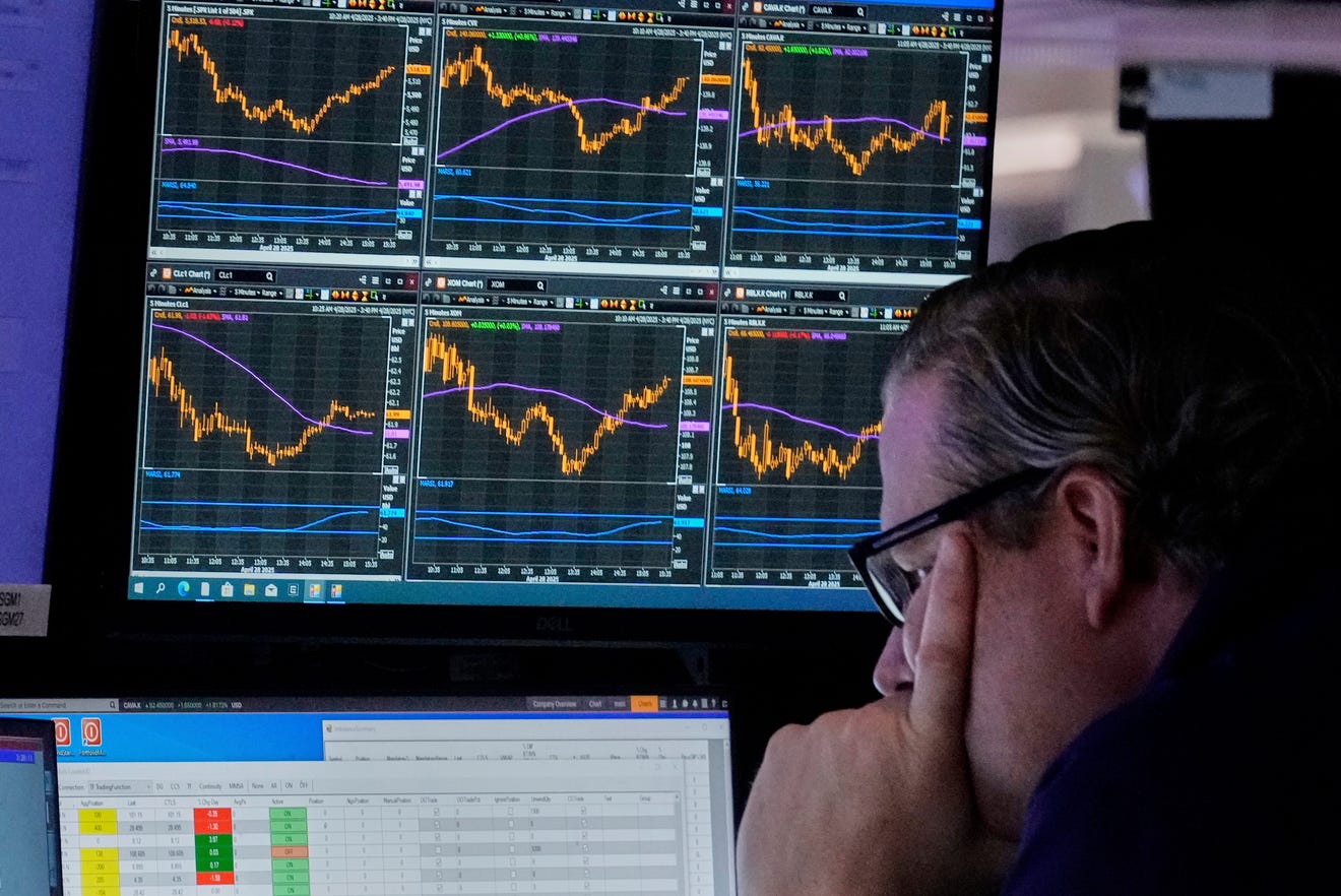 Specialist Gregg Maloney works at his post on the floor of the New York Stock Exchange, Monday, April 28, 2025.