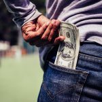 We may not all be about the Benjamins, but where we choose to park our money matters when it comes to closing the gaps left by federal climate finance freezes. (Image: Johnstocker/Adobe Stock)