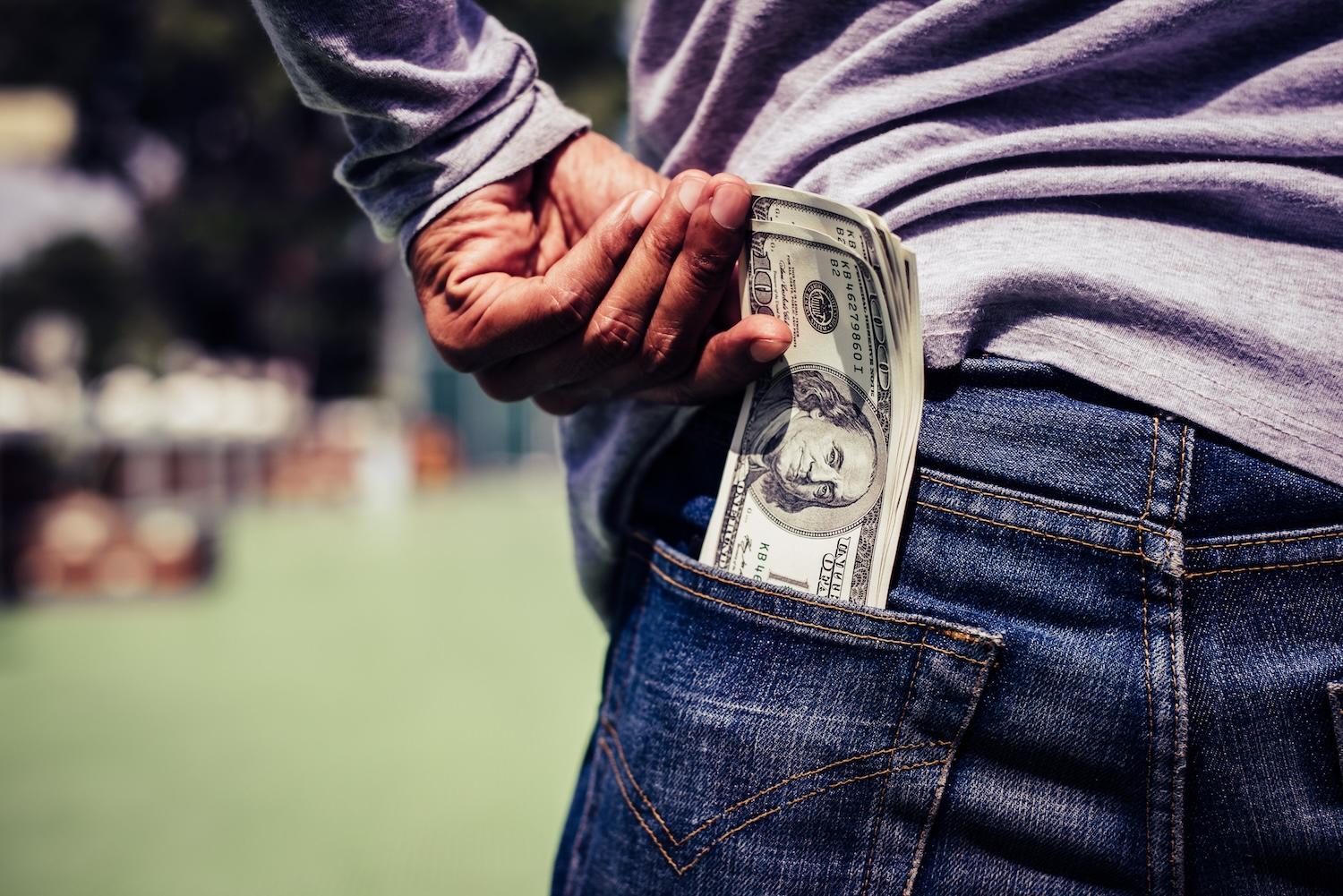 We may not all be about the Benjamins, but where we choose to park our money matters when it comes to closing the gaps left by federal climate finance freezes. (Image: Johnstocker/Adobe Stock)