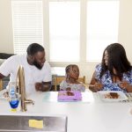 Tia Hodge with her husband, Jason, and their daughter Nevaeh at their home in Austell, Ga. Mrs. Hodge uses a “buy now, pay later” service to help cover the cost of groceries.