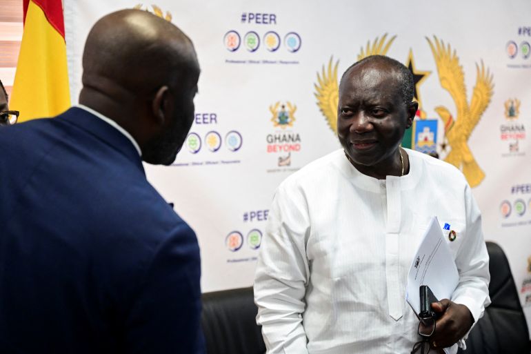 Ghana's former Finance Minister Ken Ofori-Atta, right, at a news conference in Accra, Ghana, in 2022 [File: Cooper Inveen/Reuters]