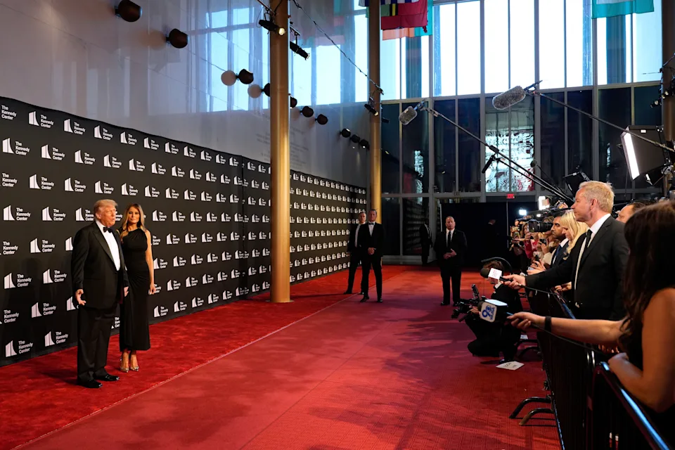President Trump and first lady Melania Trump speak to reporters before a performance of 'Les Miserables' at the Kennedy Center on June 11. (AP Photo/Alex Brandon)