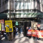 Climate activists demonstrate outside the headquarters of JP Morgan Chase in New York in 2023.